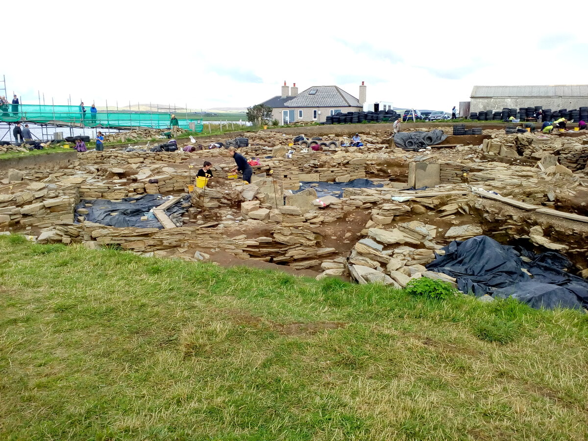 View of the Ness of Brodgar excavation showing the stone foundations of Neolithic buildings